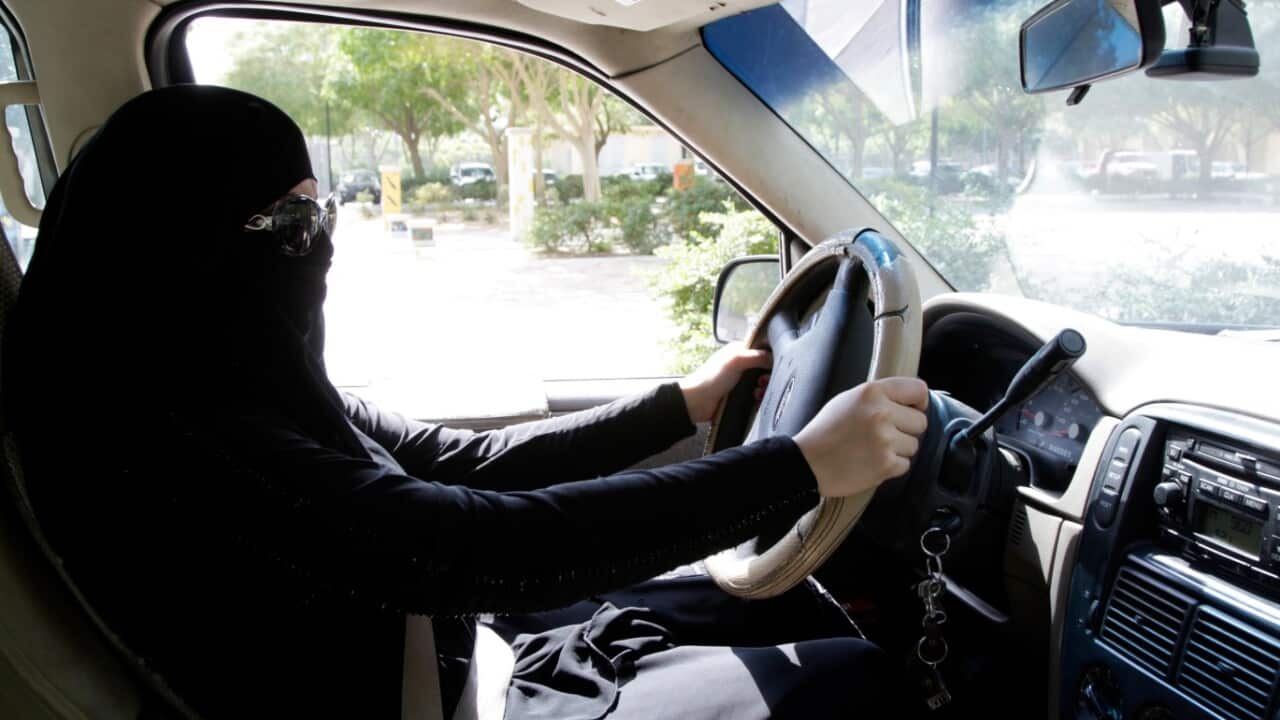 A Saudi woman sits behind the wheel of a car in Riyadh, Saudi Arabia, 28 October 2013 
