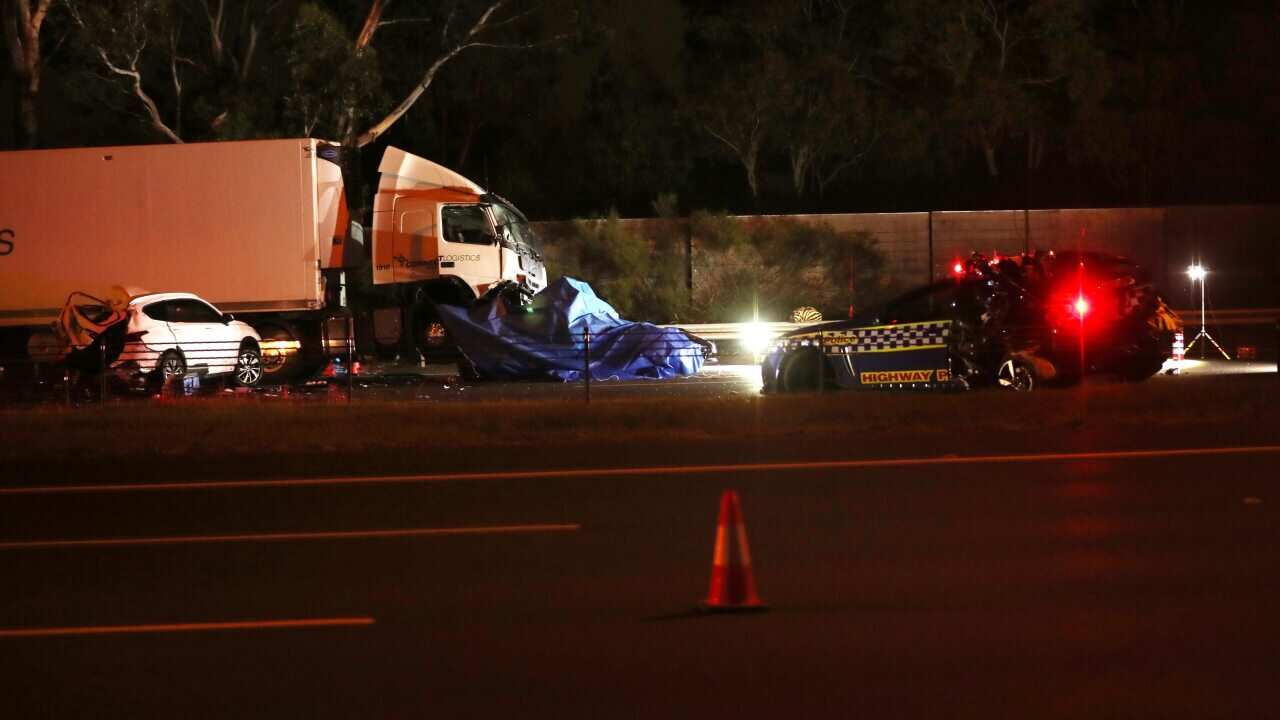 Emergency services respond to a fatal crash near the Chandler Highway in the suburb of Kew in Melbourne.