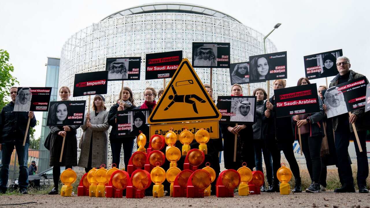 Activists of Reporters Without Borders demonstrate at the embassy of Saudi Arabia in Berlin