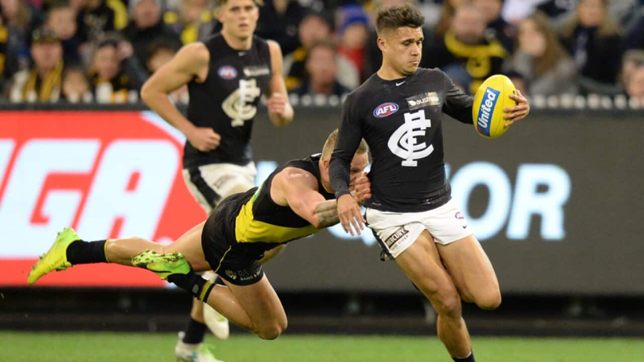 Richmond's Brandon Ellis tackling Jarrod Pickett