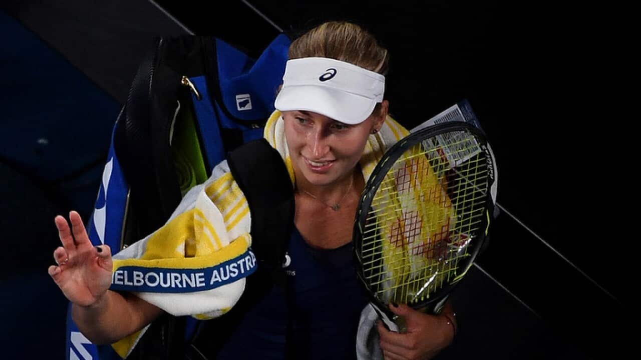 Daria Gavrilova of Australia waves while leaving Rod Laver Arena after being defeated in the Womens Singles match against Karolina Pliskova of Czech Republic in round four on day eight, at the Australian Open in Melbourne, Australia, Monday, Jan. 23, 2017