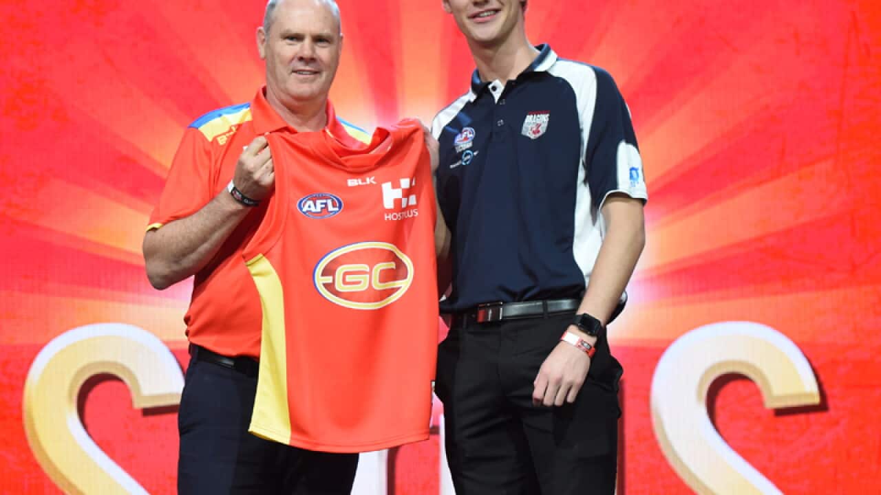 Jack Scrimshaw (right) with gold Coast Suns coach Rodney Eade