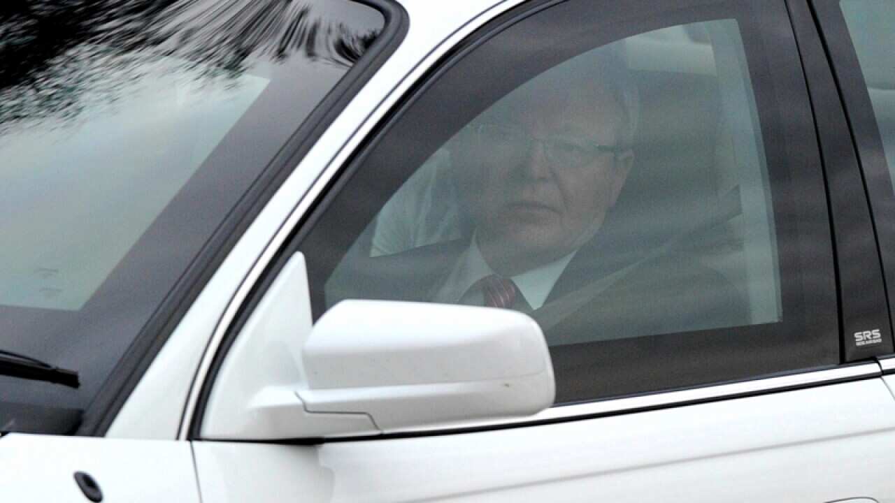 Prime Minister Kevin Rudd arrives at Parliament House in Canberra