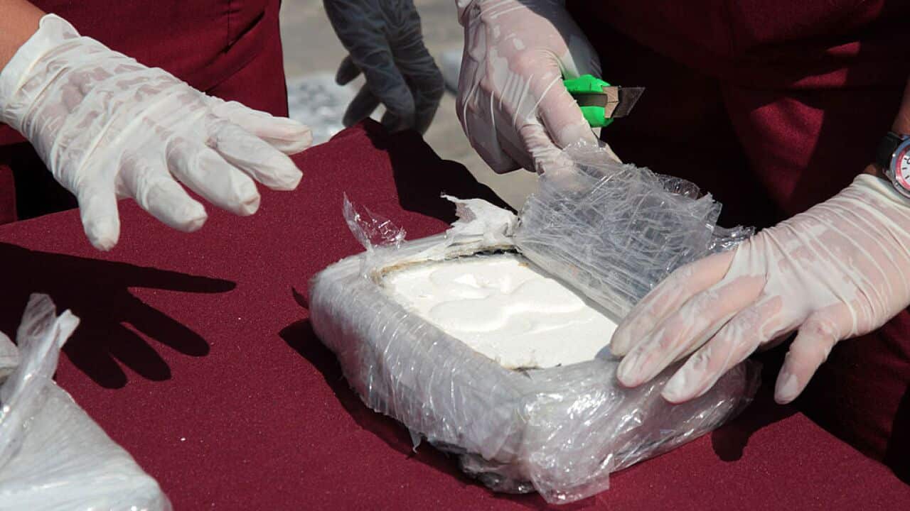 Criminology specialists test cocaine seized in Venezuela.