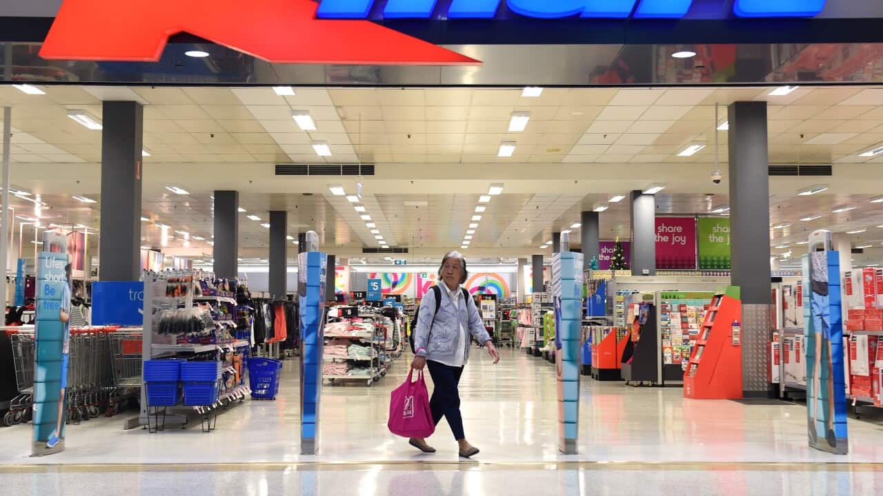 A customer outside a Kmart story in Australia.
