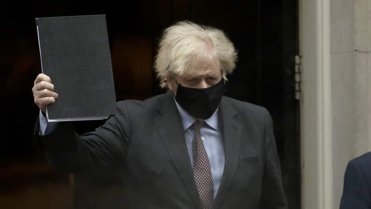 British Prime Minister Boris Johnson leaves 10 Downing Street to go to the Houses of Parliament, in London, Monday, 22 February, 2021.