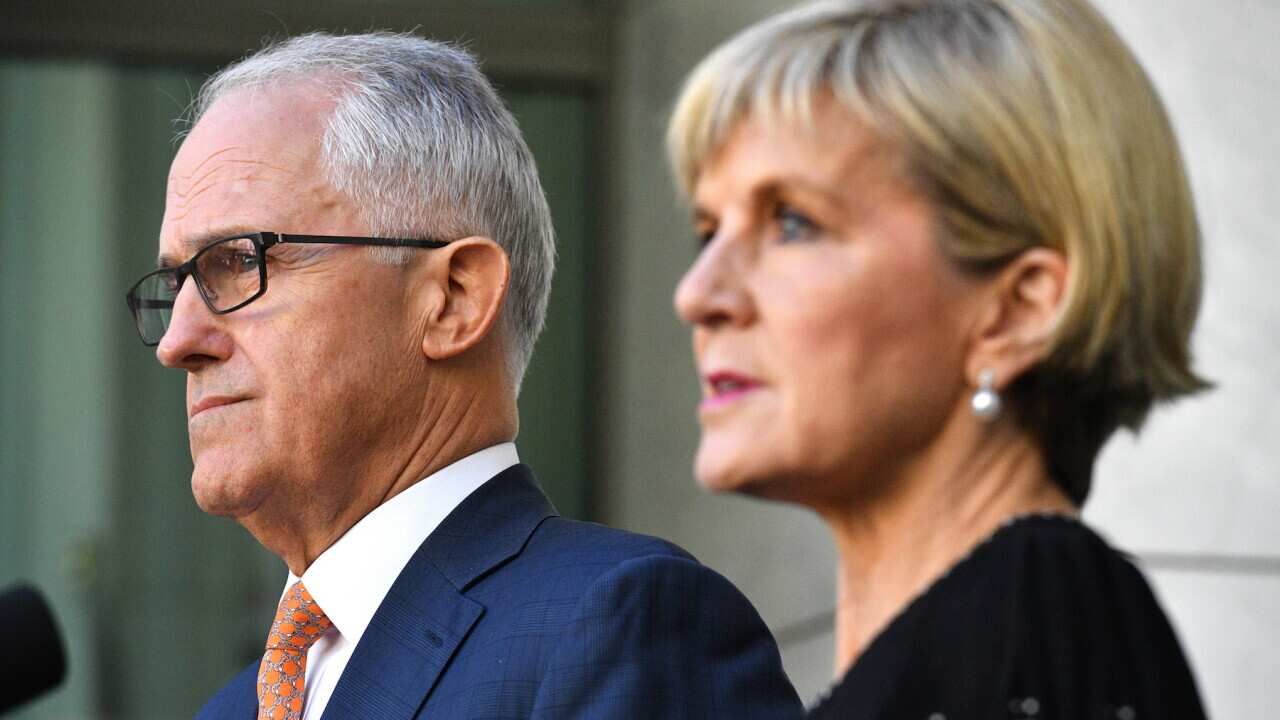 Prime Minister Malcolm Turnbull (left) and Foreign Minister Julie Bishop speak to the media during a press conference at Parliament House in Canberra, Tuesday, March 27, 2018. (AAP Image/Mick Tsikas) NO ARCHIVING