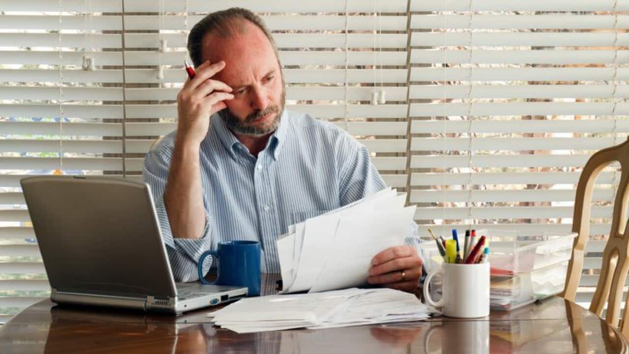 Middle Aged Male Homeowner Struggles With Paying Bills Debt Unemployment