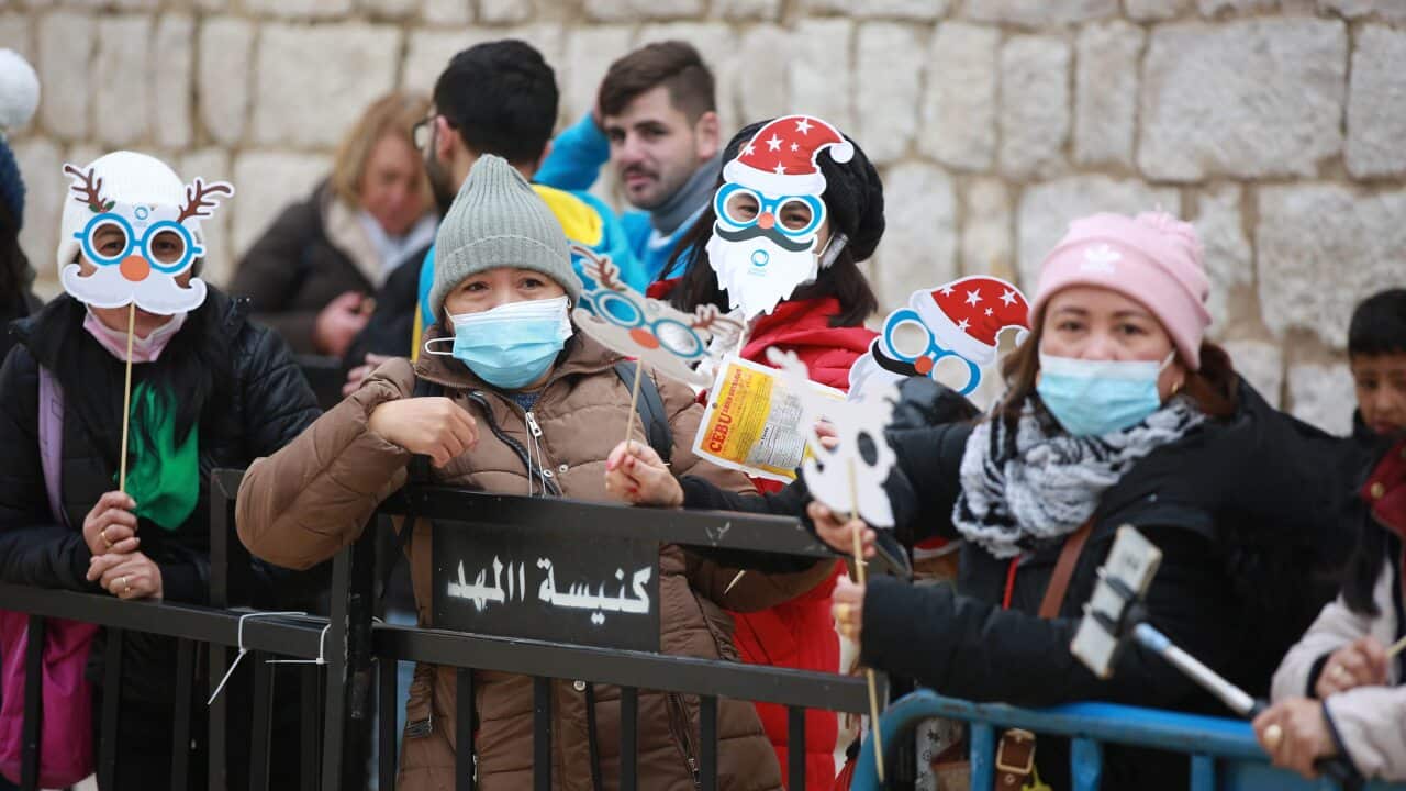 People attend a mass held at the Church of the Nativity, where Jesus is believed to have been born in Bethlehem, West Bank on 24 December, 2021.