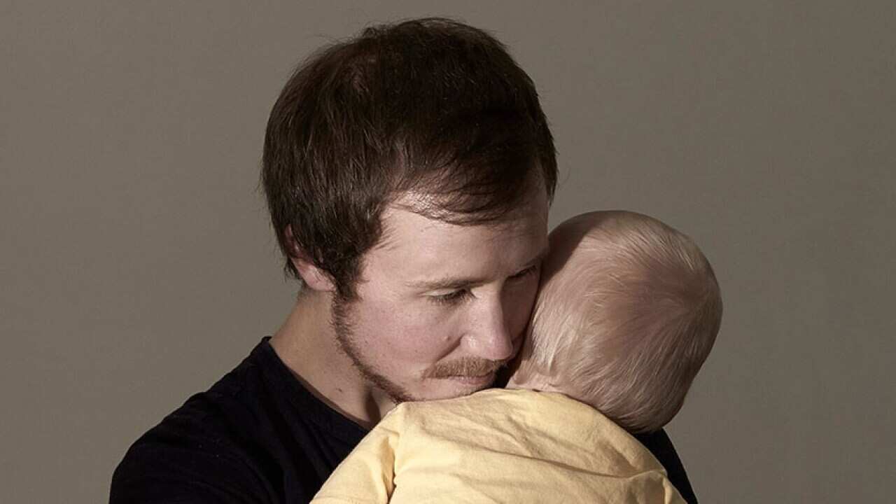 Freddy McConnell and his baby