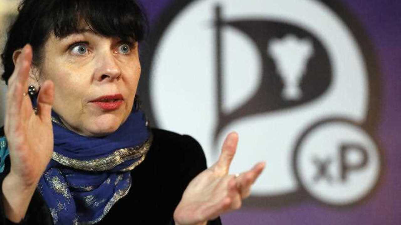 Birgitta Jonsdottir of the Pirater (Pirate) Party addresses the media during a conference in Reykjavik, Iceland, Sunday, Oct. 30, 2016