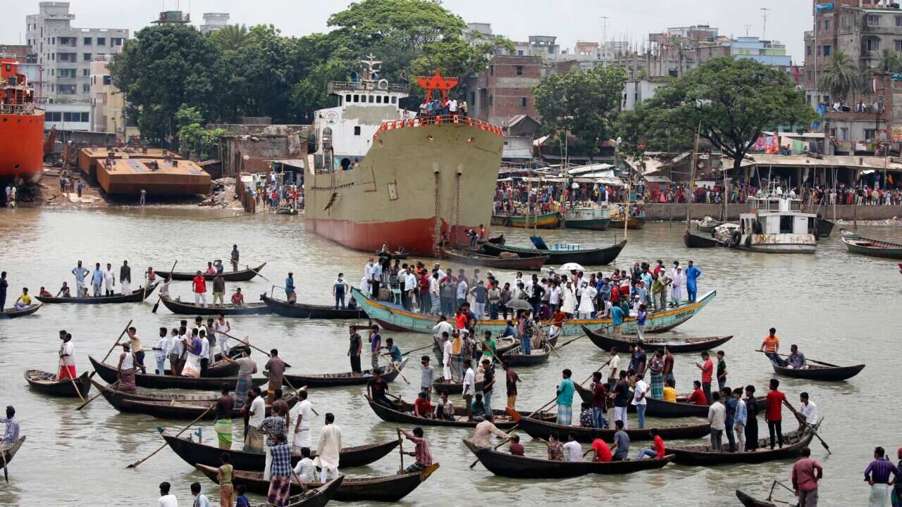 A rescue operation in the aftermath of a boat capsizing in the Buriganga river in Dhaka, Bangladesh, 29 June 2020