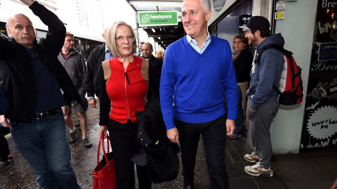 Prime Minister Malcolm Turnbull and his wife Lucy Turnbull (left) leave a function at Head Space Youth Mental health service for 14 to 25 yr olds in Bondi Juction, Sydney, Saturday, May 28, 2016. (AAP Image/Tracey Nearmy) NO ARCHIVING