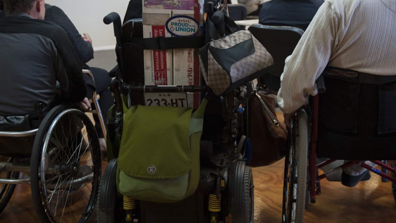 People with disabilities during a forum