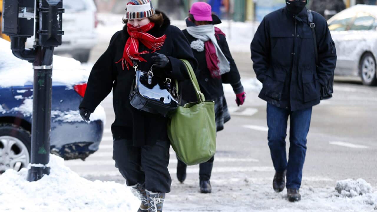 People brave the freezing weather in Chicago