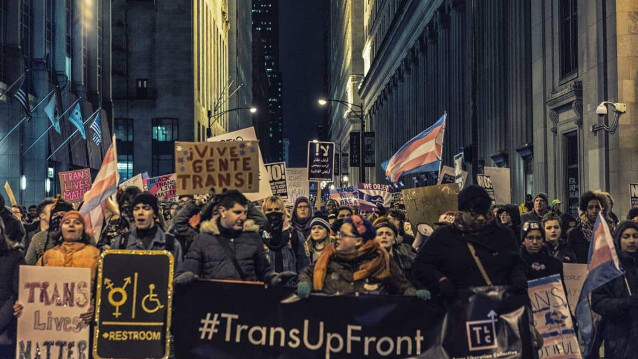 Hundreds protest for transgender rights outside Trump tower in Chicago