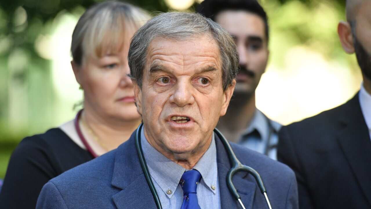 David Isaacs (C), a paediatric infectious diseases professor at the University of Sydney, penned the letter to Home Affairs Minister Peter Dutton.