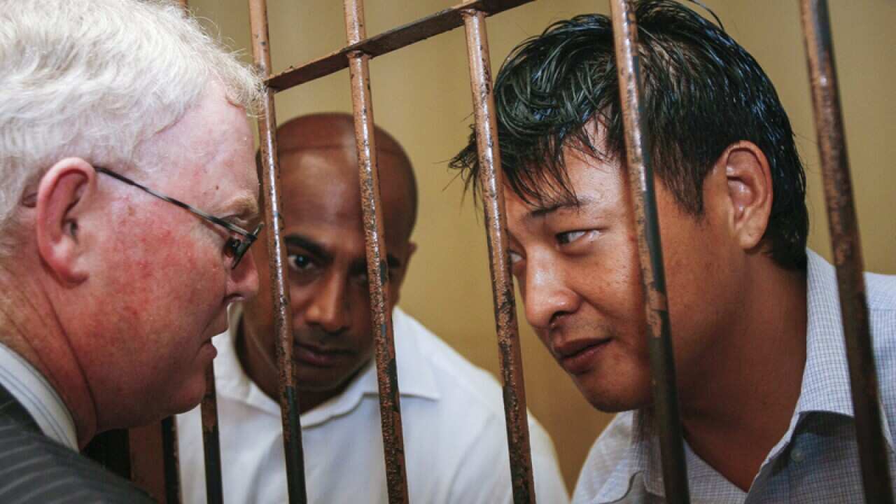 Myuran Sukumaran and Andrew Chan (R)