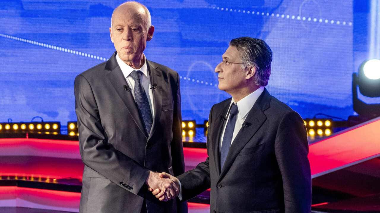 Tunisia's presidential candidate Kais Saied and Tunisia's presidential candidate and business tycoon Nabil Karoui.
