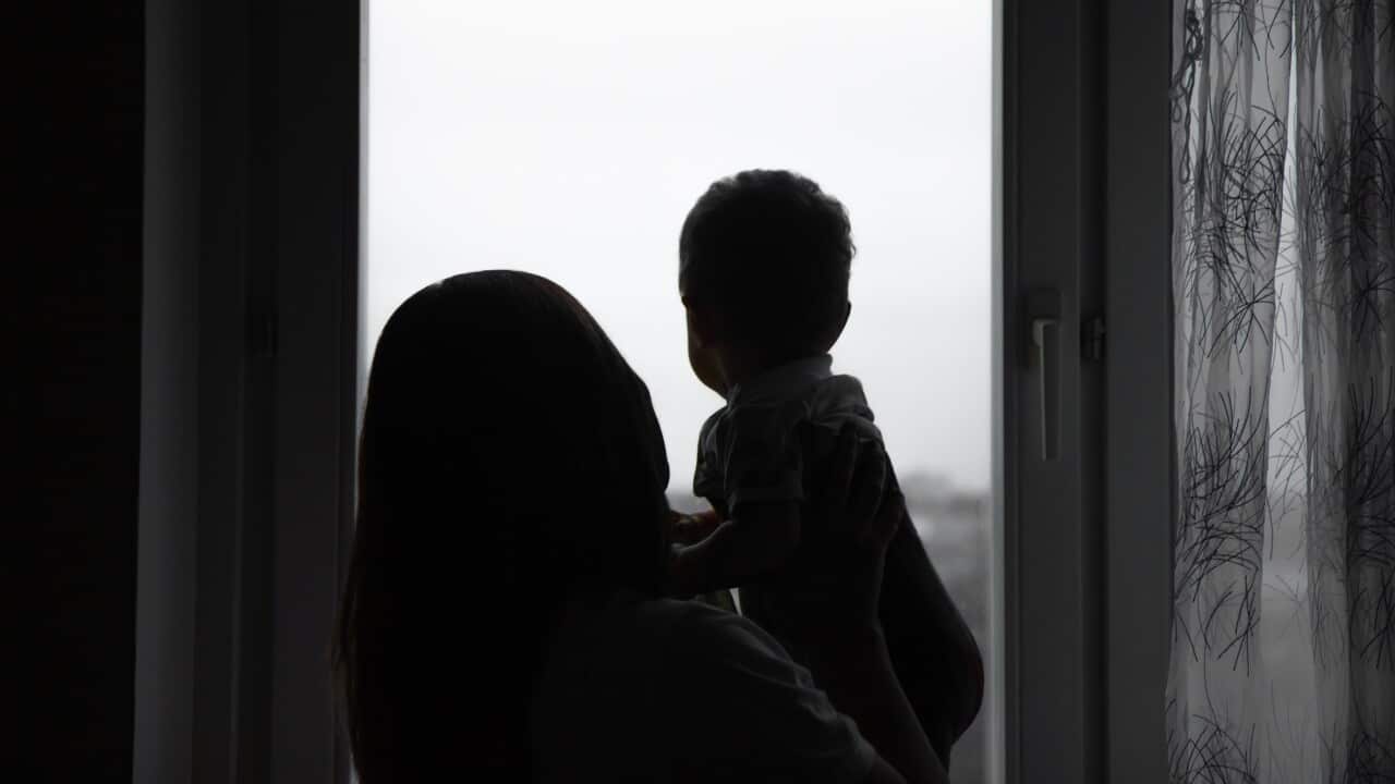 silhouettes-of-mom-and-baby-looking-out-the-window-2025-01-07-06-08-34-utc.jpg