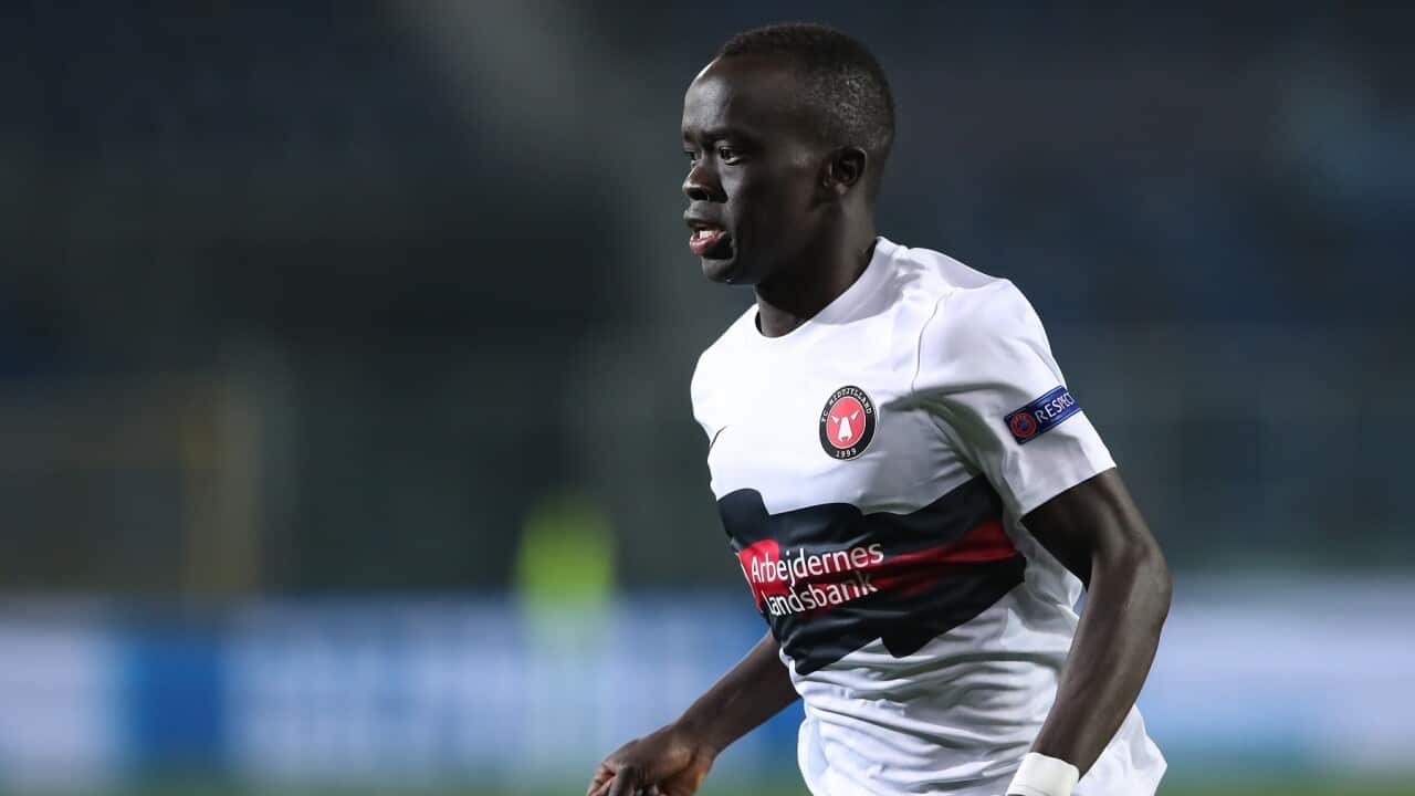 Awer Mabil, playing in a UEFA Champions League match in Italy