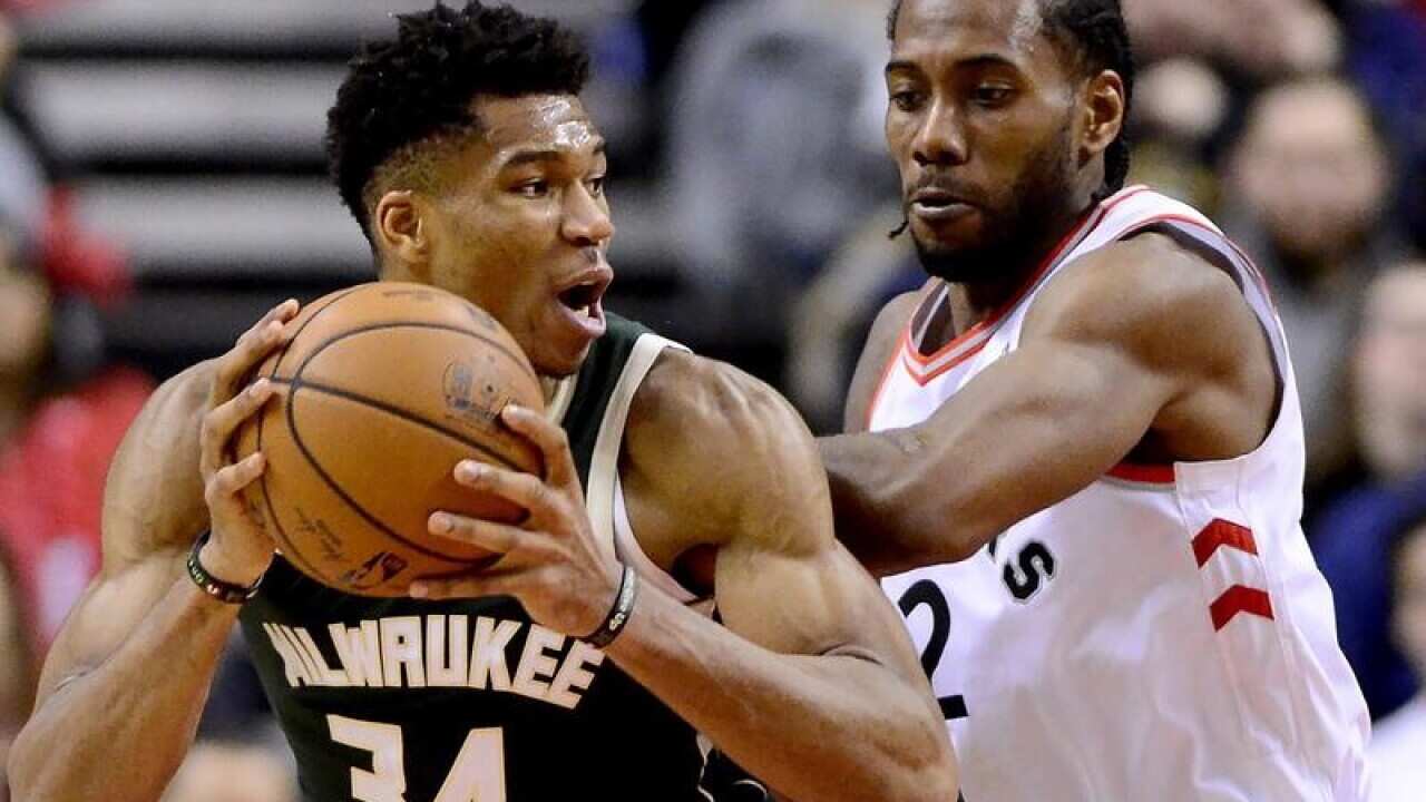 Kawhi Leonard and Giannis Antetokounmpo