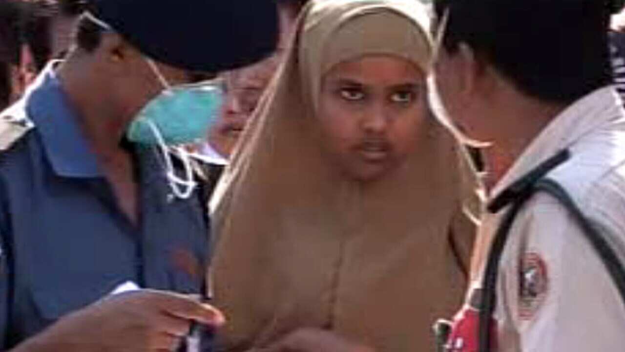 asylum_seekers_malaysia-police_L_1106_1158346789