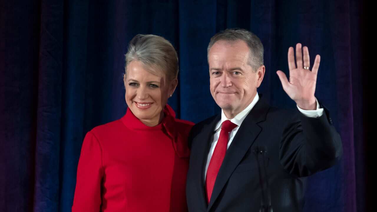 Former Labor leader Bill Shorten on stage with his wife Chloe, as he conceded defeat in the election.