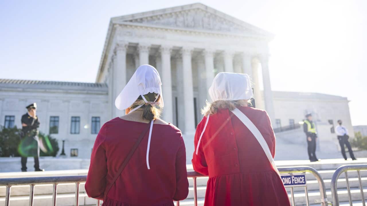 Pro-choice protesters gather outside the US Supreme Court in Washington.
