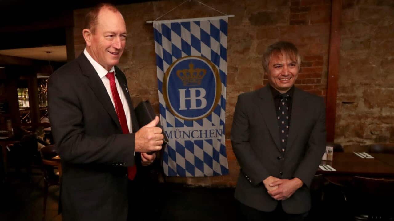 Former senator Fraser Anning (left) and with Prof Adrian Cheok (right) in Adelaide, Friday, May 3, 2019