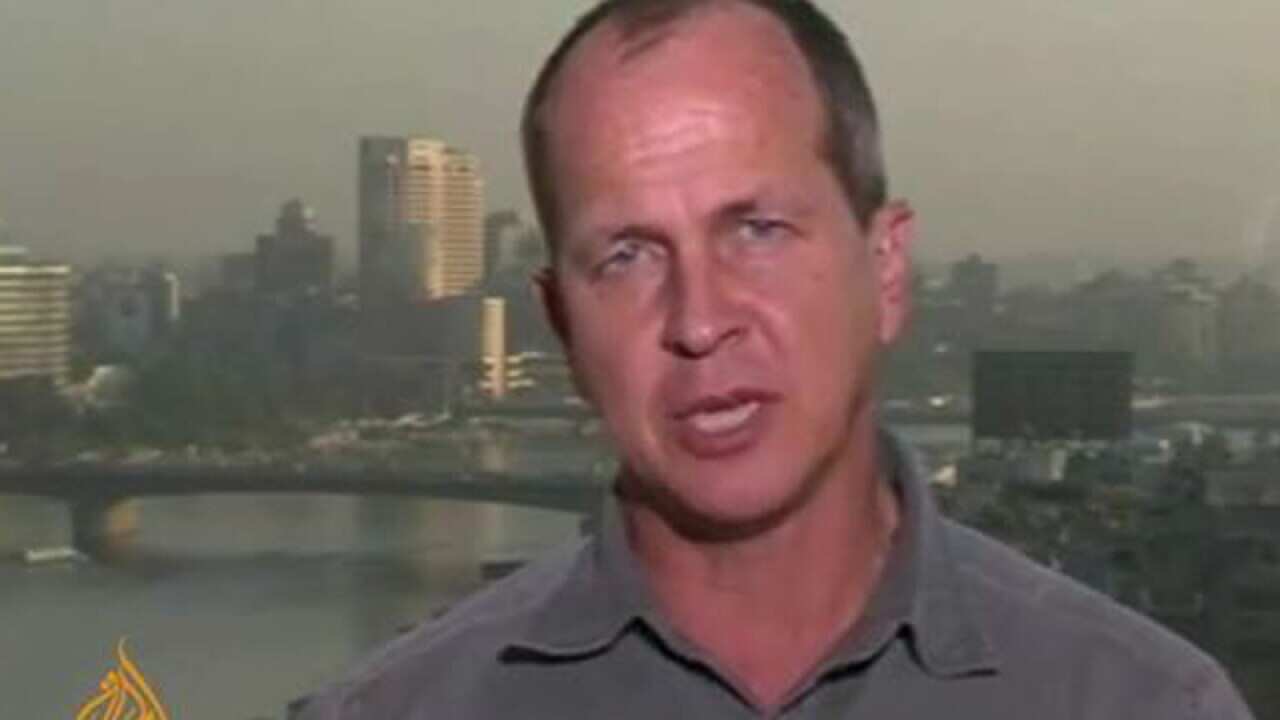 Peter Greste reporting for al Jazeera