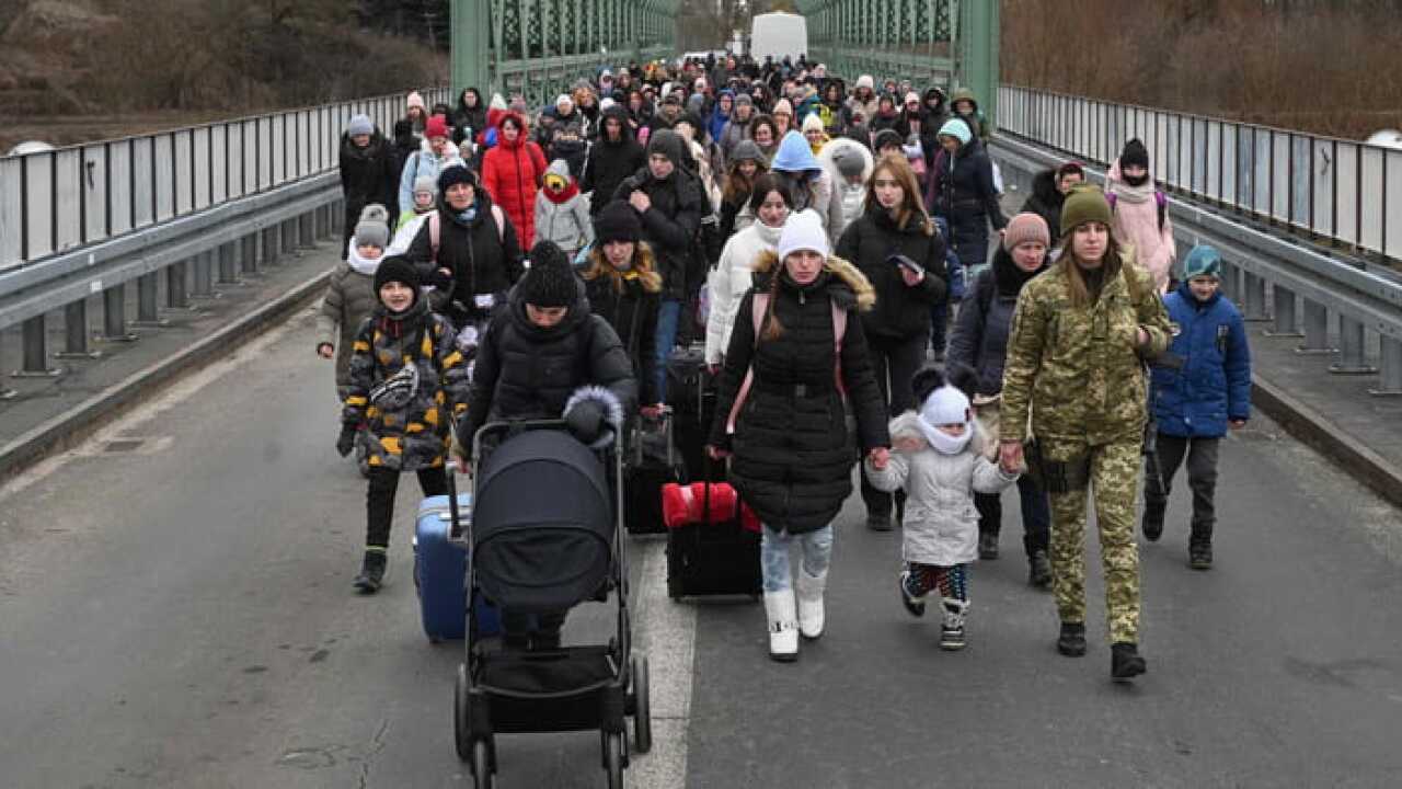 Українські біженці у буферній зоні на кордоні з Польщею. 6 березня 2022 року