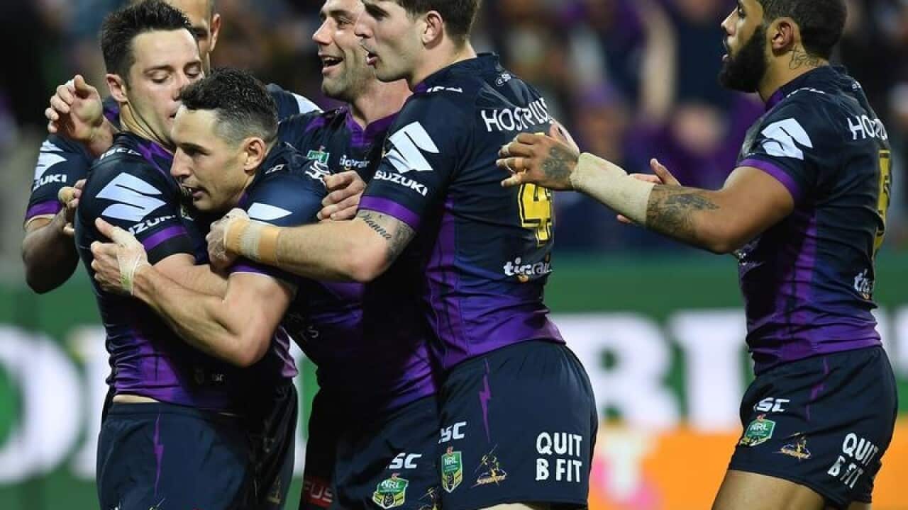 Storm players react after a Billy Slater try