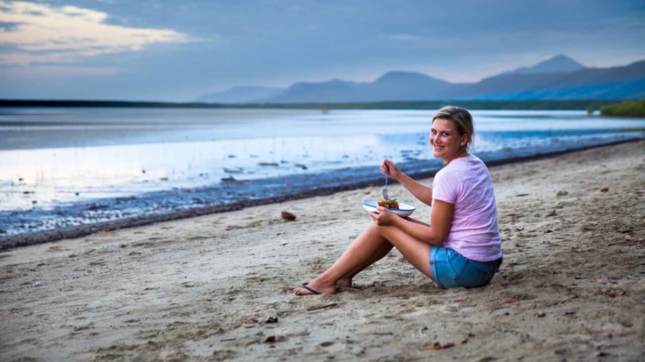 Justine Schofield on beach in Queensland