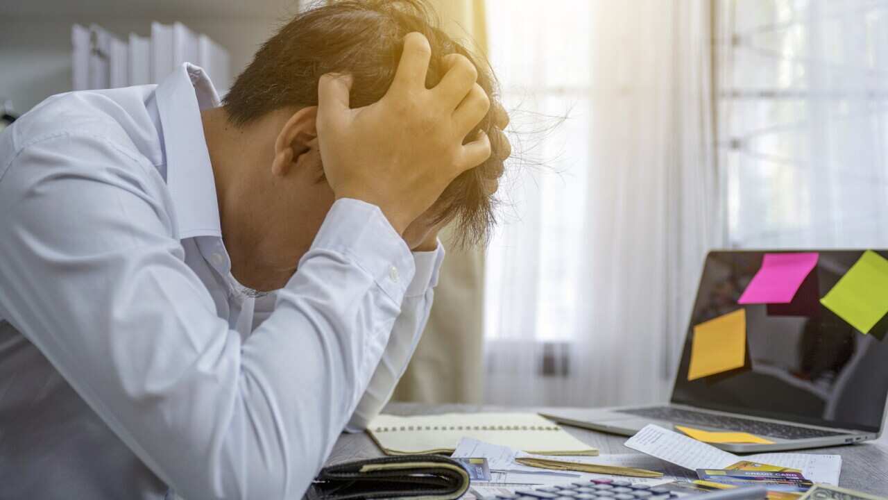 Business people stress the cost