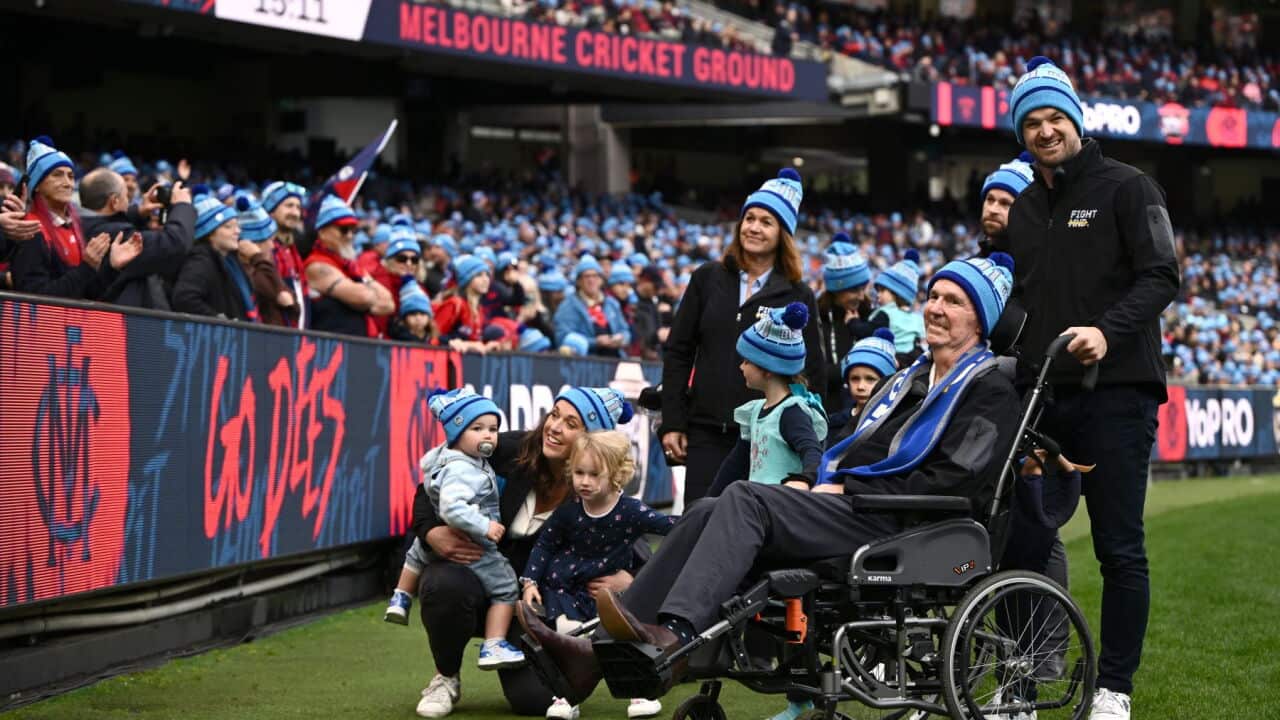 Neale Daniher s obitelji na utakmici 13. kola AFL-a između Melbourne Demonsa i Collingwood Magpiesa na MCG-u 2025.