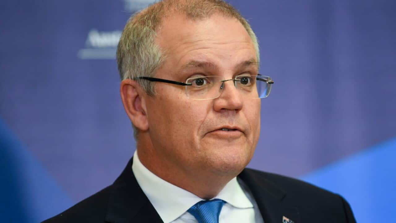 Australian Federal Treasurer Scott Morrison speaks during a press conference as he hands down the Mid-Year Economic and Fiscal Outlook 2017/18 at Parliament House in Canberra, Monday, December 18, 2017. (AAP Image/Lukas Coch) NO ARCHIVING