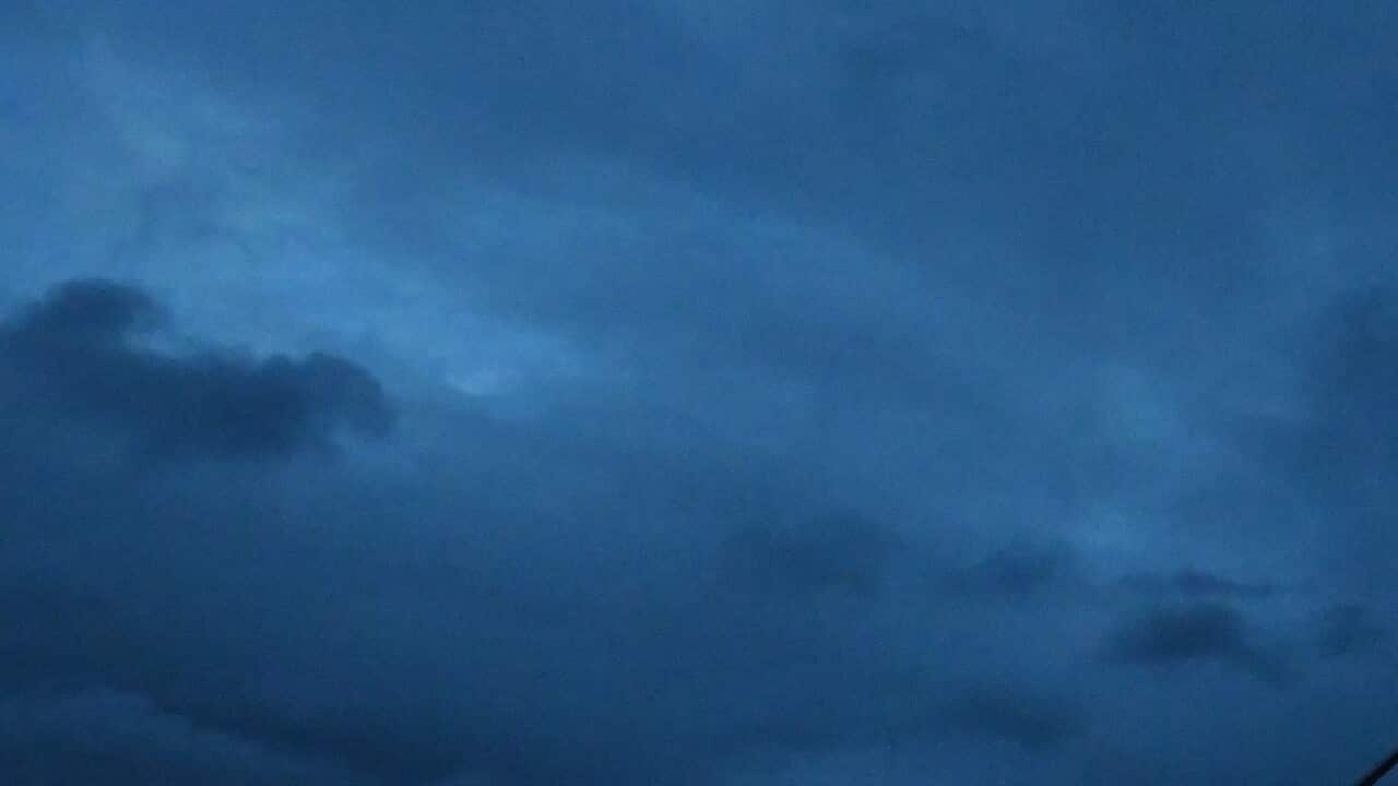 Australia’s Parliament House is illuminated with the colours of Ukraine’s flag in solidarity with the country's people and government, in Canberra, Monday, February 28, 2022. (AAP Image/Mick Tsikas) NO ARCHIVING