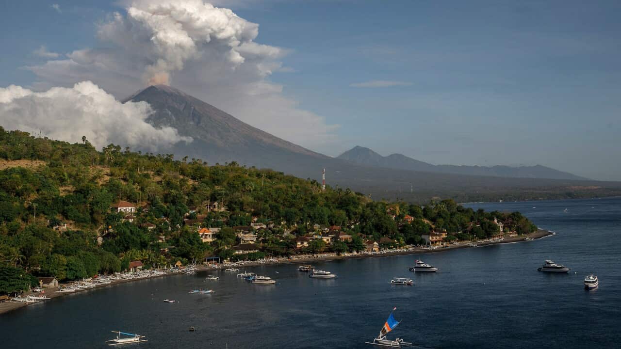 Mount Agung volcano spews hot volcanic ash into the air as seen from Amed in Karangasem, Bali, Indonesia, 29 June 2018. 