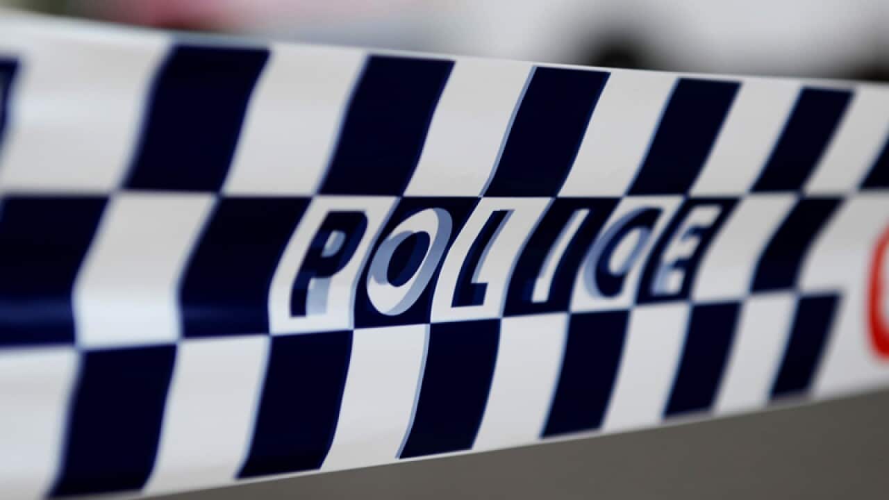 Police tape restricts access