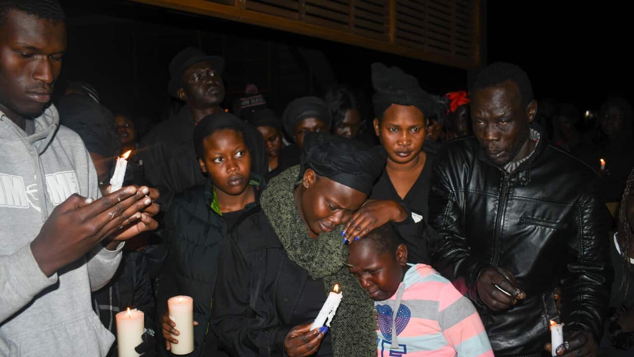 The family of Abiol, kids and their father Ayuel Akok
