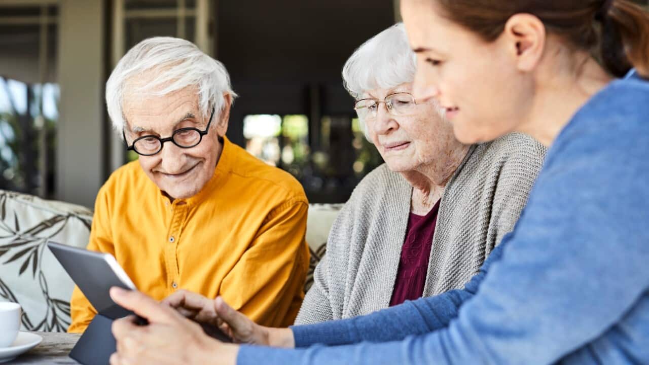 Nurse and elderly couple