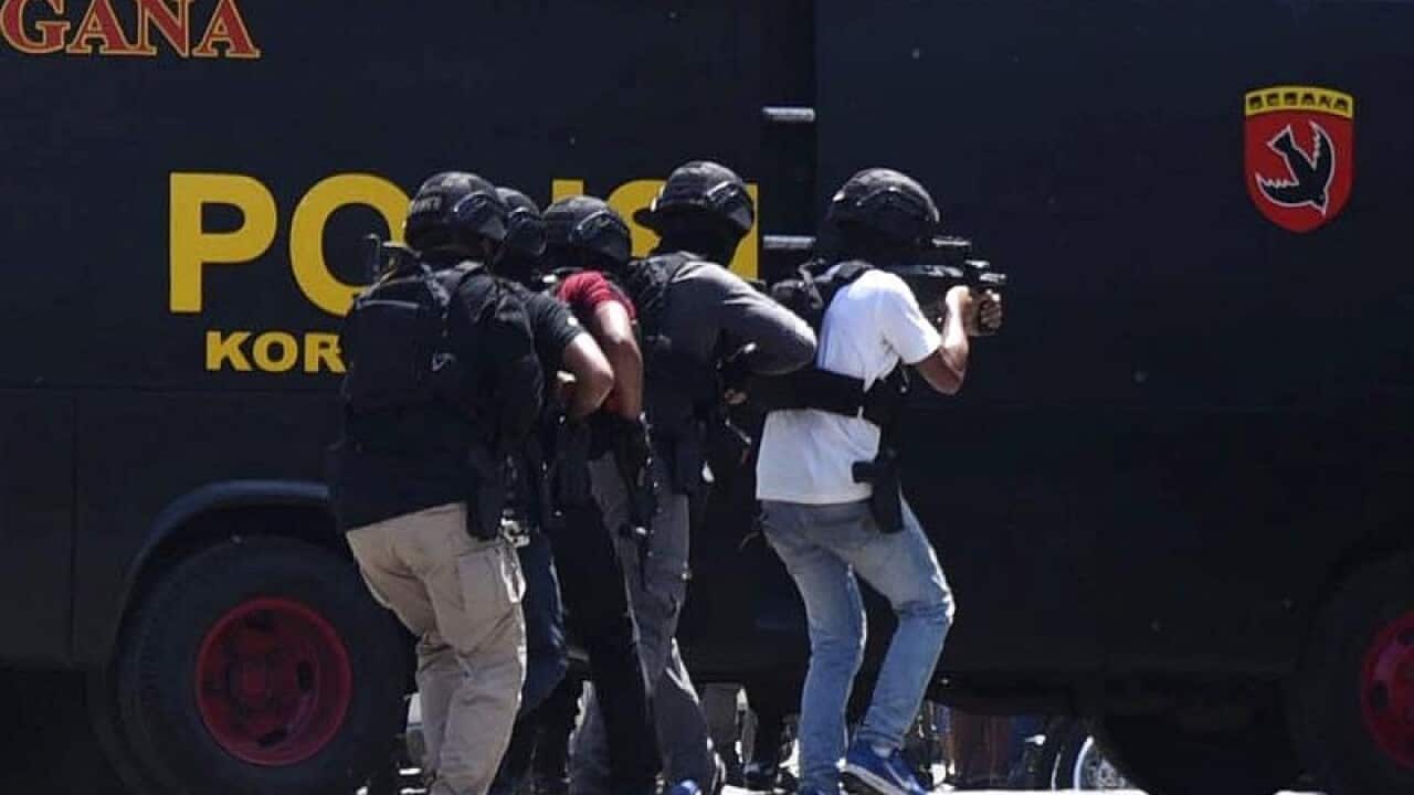 Indonesian police conduct raids after Surabaya attacks