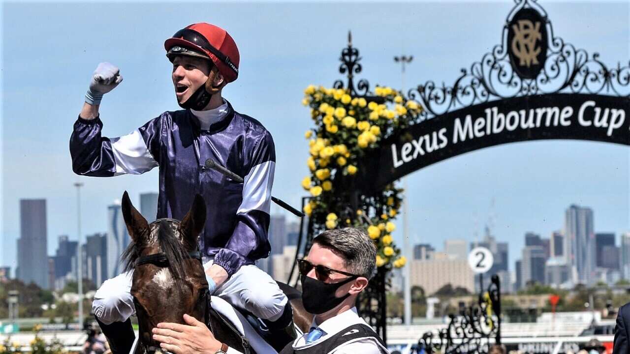 Jockey Jye McNeil returns to scale after riding Twilight Payment to victory in race 7, The Lexus Melbourne Cup, during Melbourne Cup Day at Flemington.