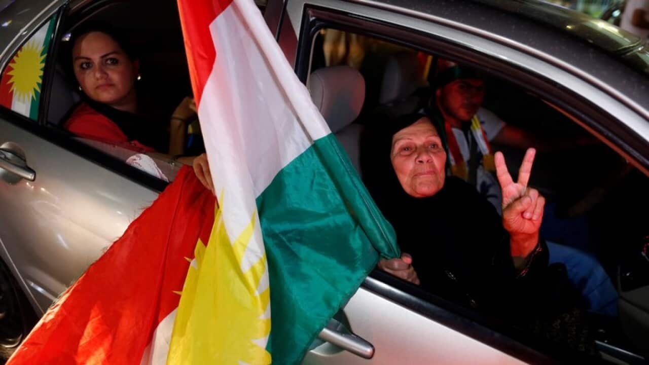 Kurds celebrate to show their support for the independence referendum in in Erbil, Kurdistan region in northern Iraq, 25 September 2017.