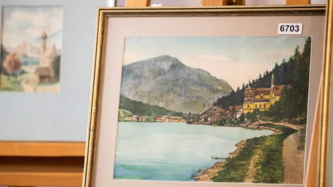 Watercolour entitled 'Ortschaft an Vorgebirgssee' signed A. Hitler on display at Weidler auction house.