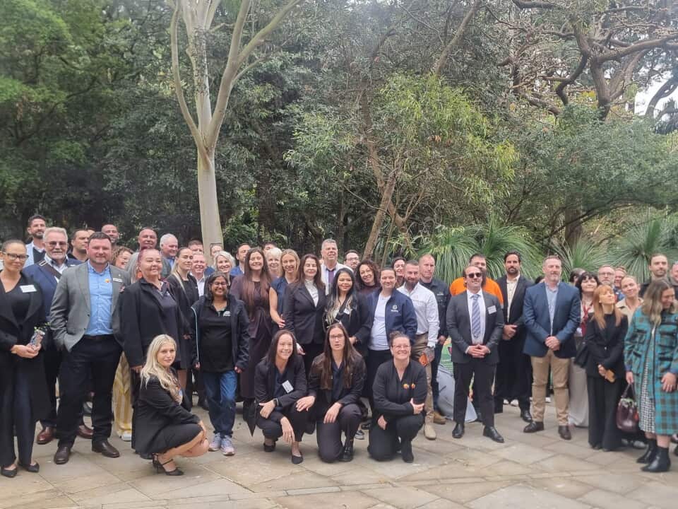 New South Wales Indigenous Chamber of Commerce and cohort with a 20th Anniversary commemorative bench unveiling at the Indigenous Botanical Gardens