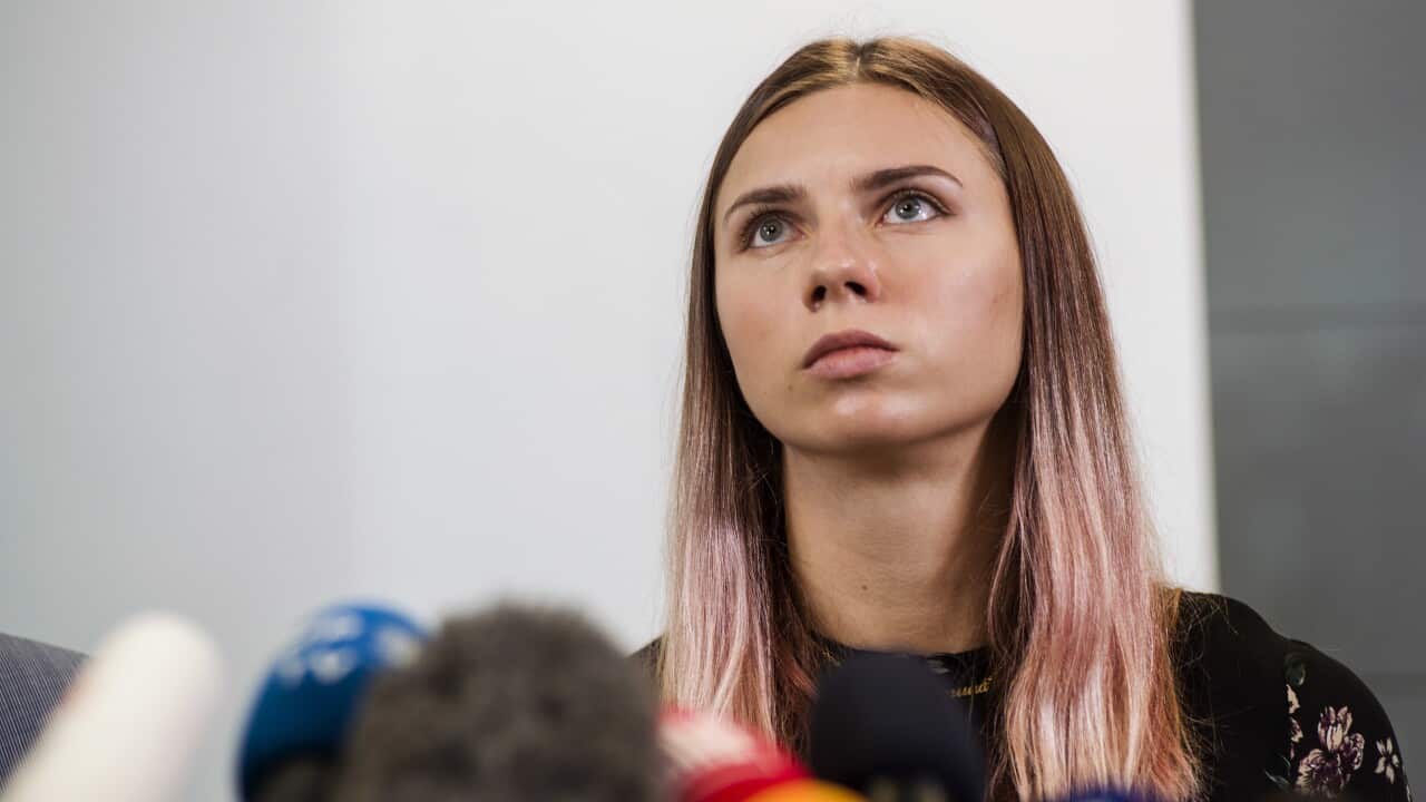 Krystsina Tsimanouskaya during a press conference.