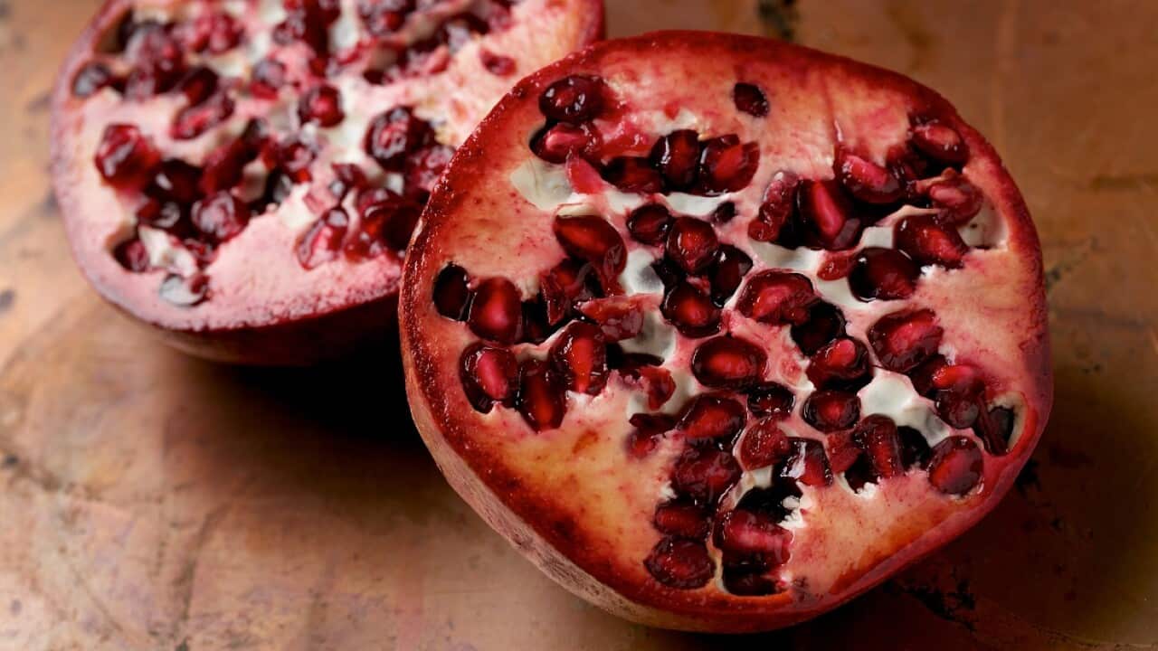 The cases have been linked to imported frozen pomegranate products.