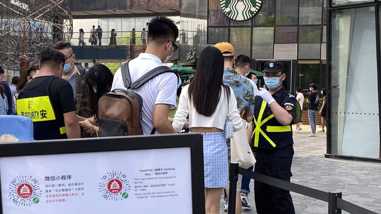 To track and monitor people’s health, residents have to display a QR code on their phones to show they’re not sick.